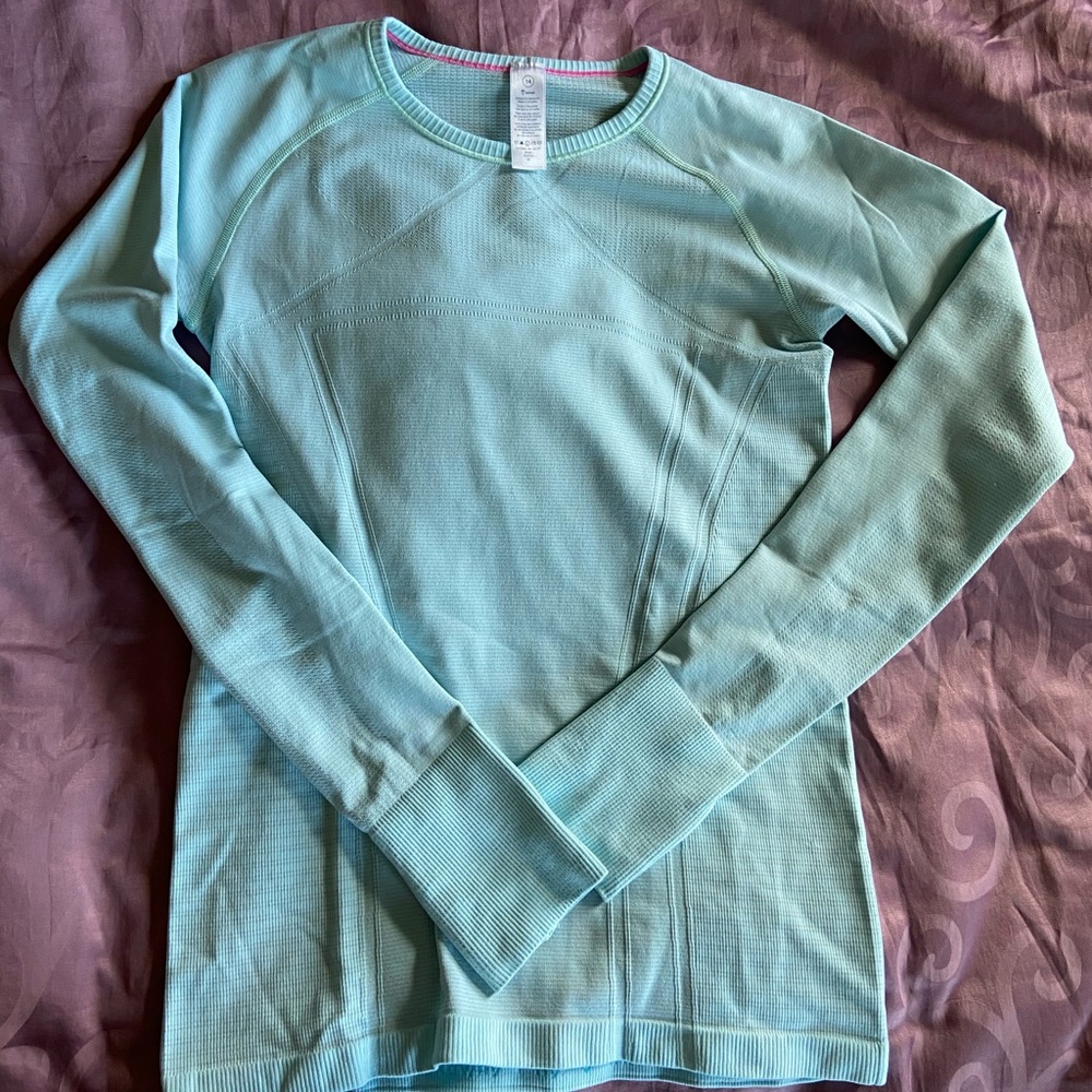 Ivivva Fly Tech Long Sleeve in aqua blue.